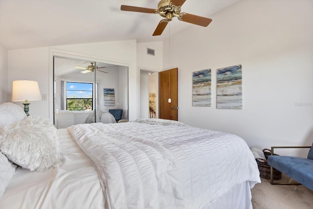 bedroom with lofted ceiling, visible vents, carpet floors, and ceiling fan