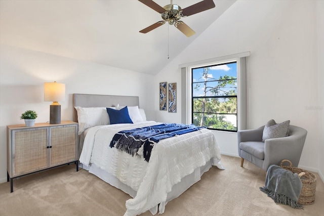 bedroom featuring high vaulted ceiling, light colored carpet, and ceiling fan