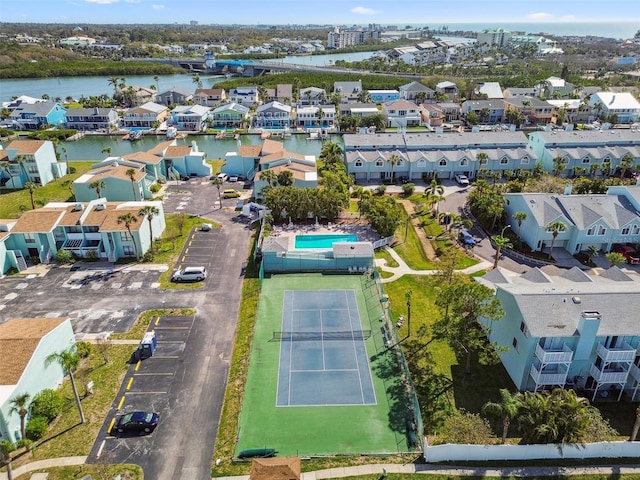 bird's eye view with a water view and a residential view