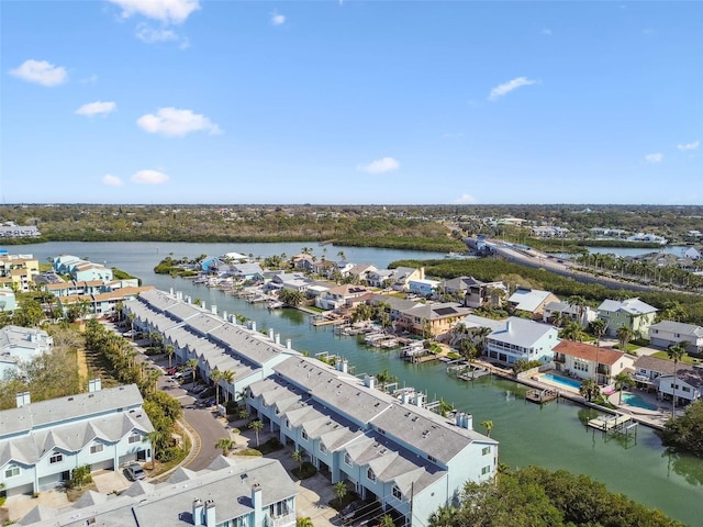 bird's eye view with a water view and a residential view