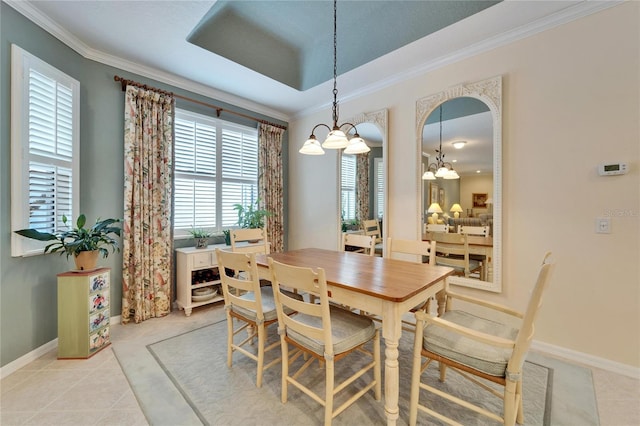 dining room with light tile patterned floors, baseboards, arched walkways, and crown molding