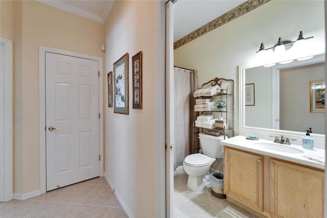 full bathroom featuring crown molding, toilet, vanity, tile patterned flooring, and baseboards