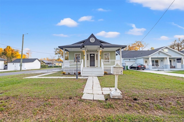 view of front of property with covered porch, a front yard, and a residential view