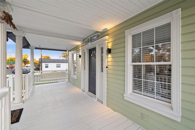 wooden deck with a porch