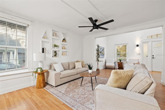 living room featuring a healthy amount of sunlight and wood finished floors