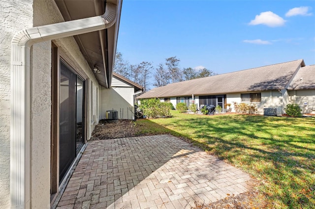 exterior space featuring central AC unit