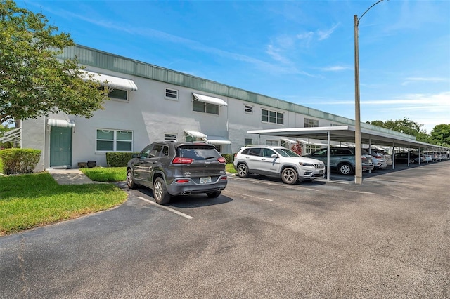 view of partially covered parking lot