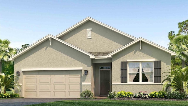 view of front of house featuring driveway, an attached garage, and stucco siding