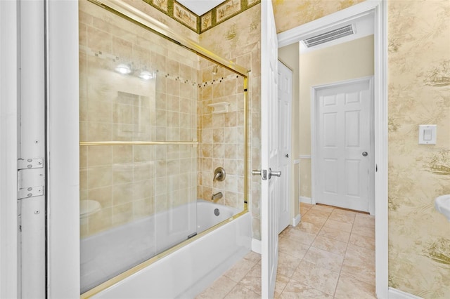 bathroom with wallpapered walls, tile patterned flooring, enclosed tub / shower combo, and visible vents