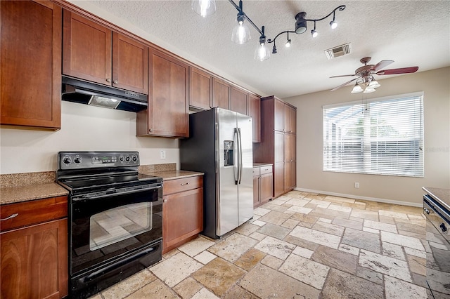 kitchen with stone tile floors, visible vents, black range with electric stovetop, under cabinet range hood, and stainless steel refrigerator with ice dispenser