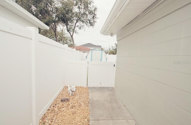 view of patio / terrace with fence and a gate