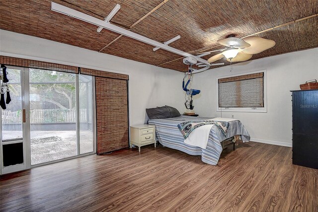 bedroom with wood ceiling, access to outside, baseboards, and wood finished floors