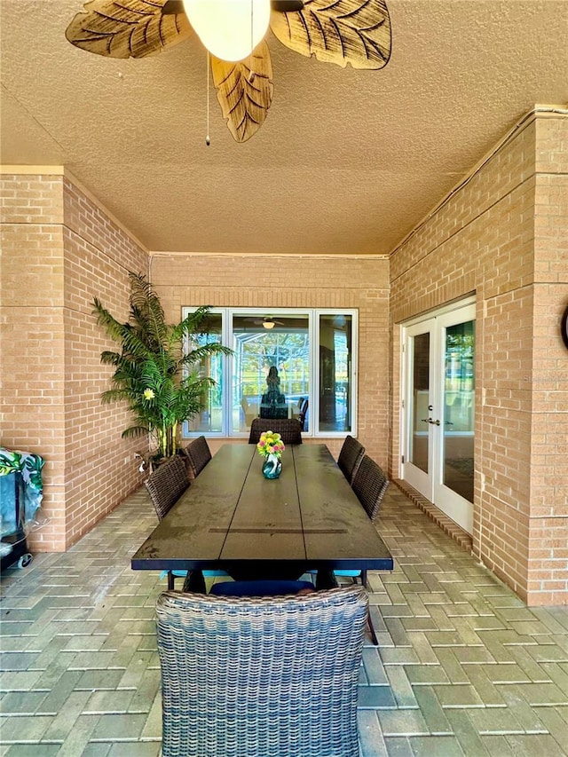 view of patio / terrace with outdoor dining area and french doors