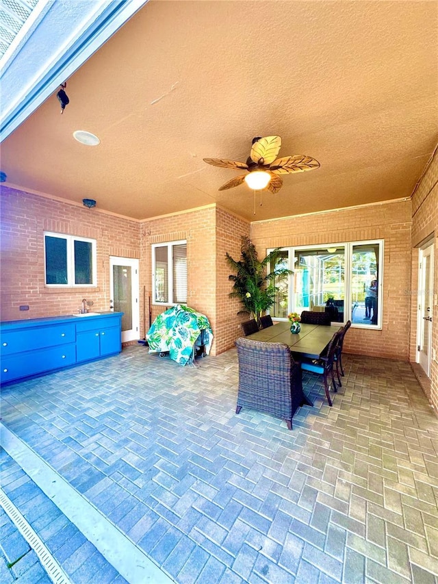 view of patio with ceiling fan