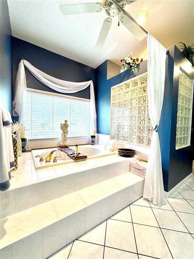 full bath featuring a bath and tile patterned floors