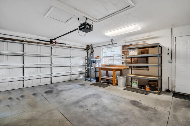 garage featuring a garage door opener