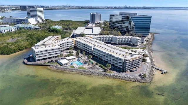 bird's eye view featuring a water view and a city view