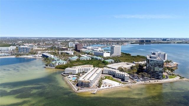 bird's eye view featuring a water view and a view of city