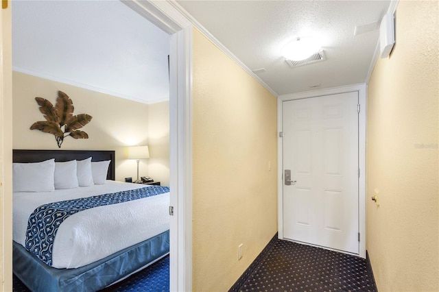 interior space featuring visible vents, crown molding, and carpet flooring