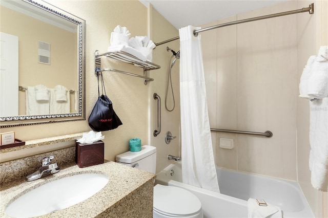 bathroom featuring shower / bath combination with curtain, visible vents, vanity, and toilet