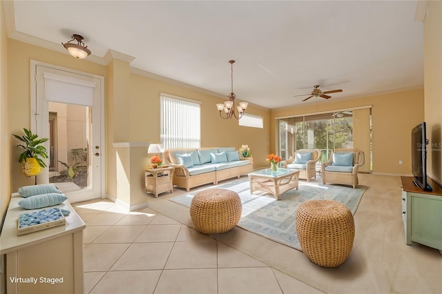 living area featuring a wealth of natural light, crown molding, baseboards, and light tile patterned floors