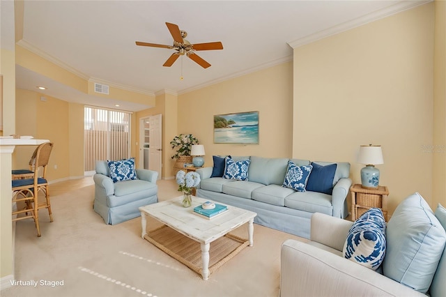 living area with ceiling fan, light carpet, visible vents, baseboards, and crown molding