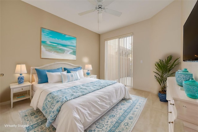 bedroom featuring light carpet, ceiling fan, and baseboards