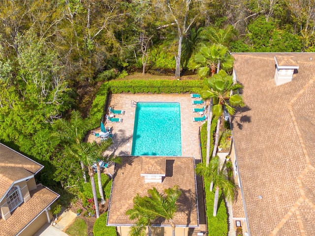 community pool with a patio