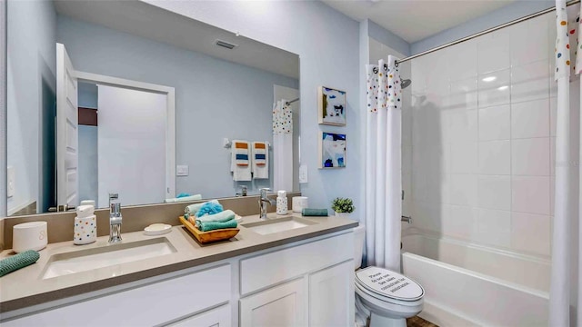 full bathroom with toilet, a sink, visible vents, and shower / bathtub combination with curtain