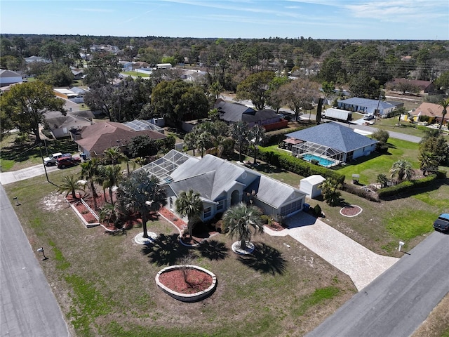 birds eye view of property with a residential view