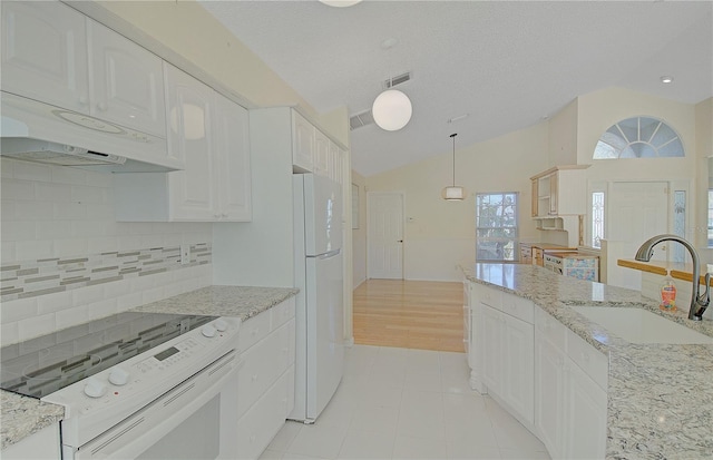 kitchen with visible vents, a sink, white cabinetry, white appliances, and vaulted ceiling