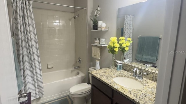 bathroom featuring vanity, toilet, and shower / tub combo with curtain