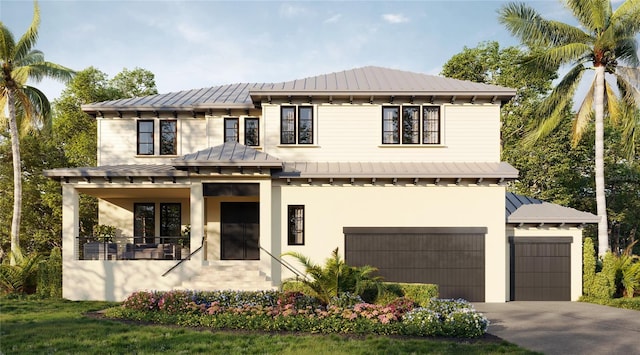 view of front facade with a standing seam roof, covered porch, metal roof, and driveway