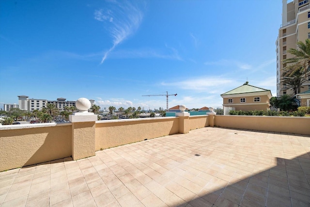 view of patio with a balcony