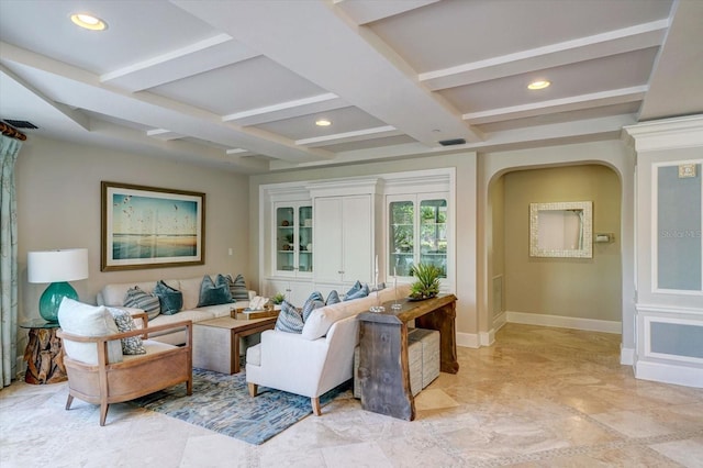 living area featuring arched walkways, recessed lighting, coffered ceiling, beamed ceiling, and baseboards