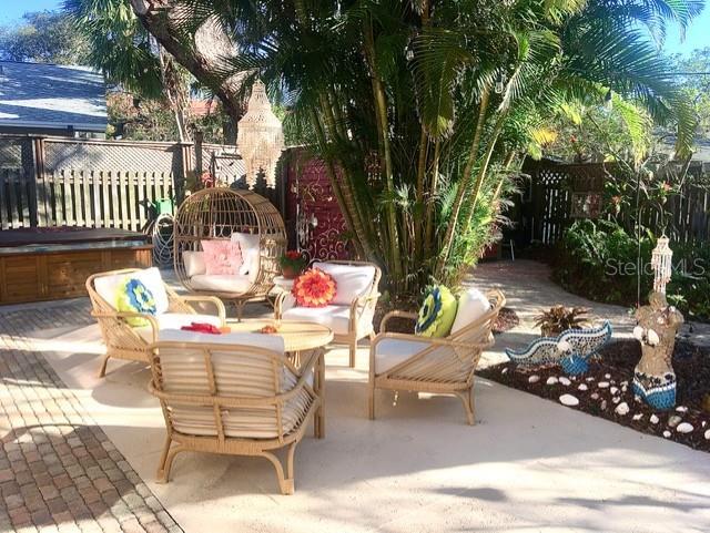 view of patio / terrace with outdoor lounge area and fence