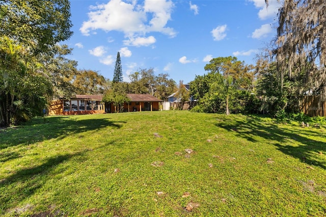 view of yard featuring fence