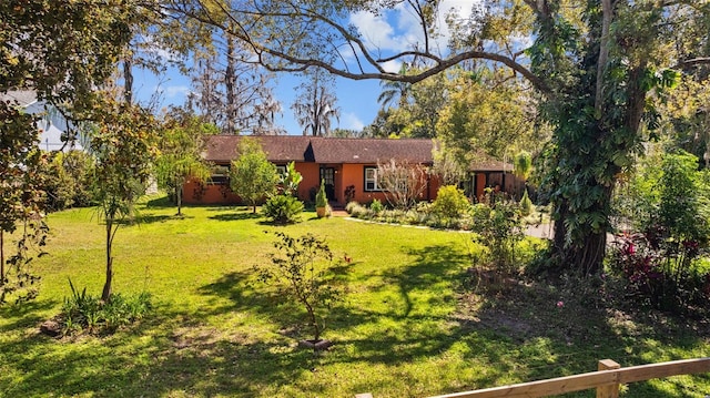 view of front of property with a front lawn