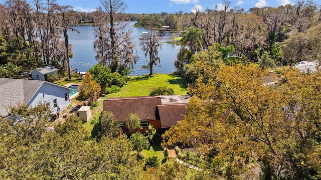 birds eye view of property with a water view