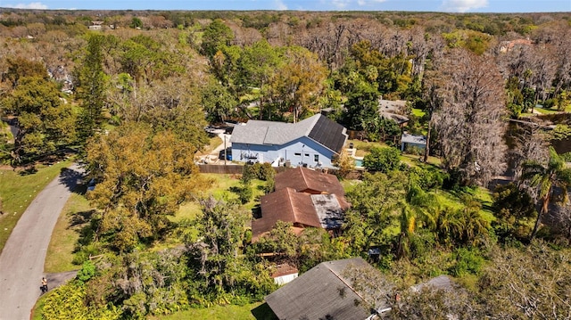 aerial view featuring a view of trees