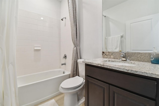 full bath featuring vanity, toilet, and shower / tub combo with curtain