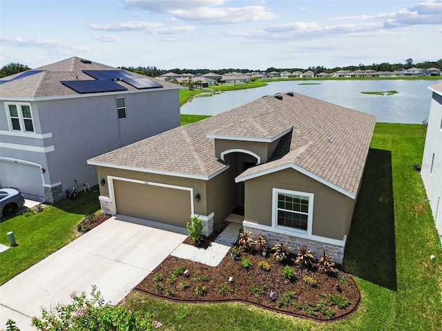 view of front of house featuring a garage, stone siding, and stucco siding