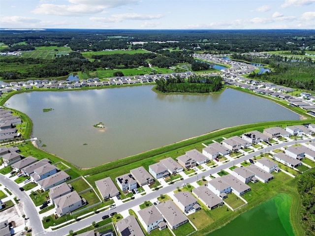 bird's eye view featuring a residential view and a water view