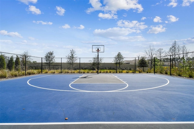 view of sport court featuring community basketball court and fence