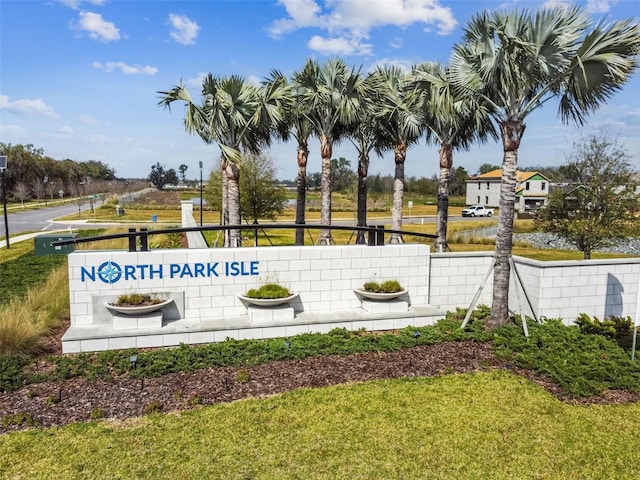 community sign with fence