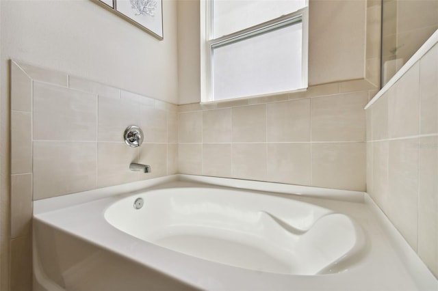 bathroom featuring a garden tub