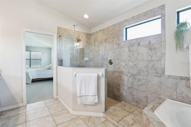 full bath with a walk in shower, baseboards, tile patterned flooring, and ensuite bathroom