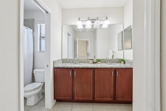 full bathroom featuring tile patterned flooring, a sink, toilet, and double vanity