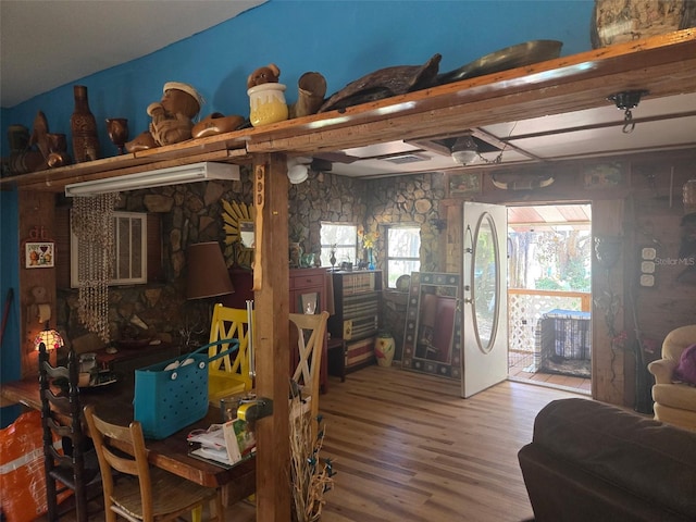 interior space featuring plenty of natural light and wood finished floors