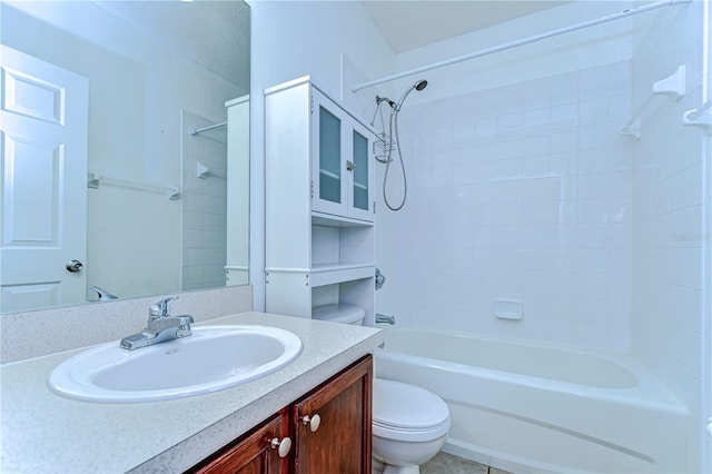 bathroom with toilet, vanity, and bathing tub / shower combination